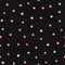 Simple seamless pattern with scattered pink hearts on black background.