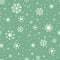 Simple seamless pattern with white snowflakes on green background. Can be used for wallpaper, pattern fills, textile