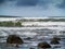 Simple seascape, powerful waves and cloudy sky, nobody