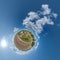 simple tiny planet without buildings in blue sky with beautiful clouds. Transformation of spherical panorama 360 degrees.