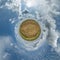 simple tiny planet without buildings in blue sky with beautiful clouds. Transformation of spherical panorama 360 degrees.