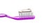 Simple Toothbrush on a White Background with Toothpaste Applied