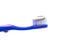 Simple Toothbrush on a White Background with Toothpaste Applied