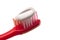 Simple Toothbrush on a White Background with Toothpaste Applied