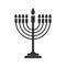 Simple vector icon of the menorah, a seven-candle candlestick. Stock design isolated on a white background