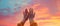 A simple, vibrant image of uplifted hands against a serene sky, symbolizing surrender and devotion in worship