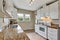 Simple white kitchen room with granite counters