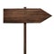 Simple wooden arrow signpost roadsign made of dark wood with single pole