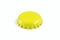 A simple yellow cap isolated on white background. Metallic cap for glass bottle