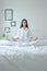 Simple yoga posture on the mattress