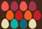 Simplicity Easter eggs shapes with basic retro 70s colors red orange beige vine colorful, one by one on brown background