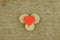 simplicity love: red heart lies on a self-sewed a linen fabric Golden brown color of natural linen, decorated with 3 slices of