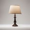 Simplistic Table Lamp With Beige Shade On Grey Background