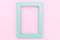 Simply design with empty blue frame isolated on pink pastel colorful background