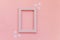 Simply minimal composition winter objects pink frame snowflakes isolated on pink pastel background