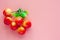 Simulation fake and artificial fruit on pink background