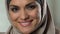 Sincere muslim female smiling on camera, femininity and beauty healthy lifestyle