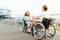 Sincere senior man giving a present to a nice wheelchaired woman