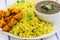 Sindhi platter- garlic rice,fried potatoes and lentils