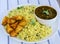 Sindhi thali- garlic rice,fried potatoes and lentils