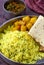 SIndhi traditional meal - lentils rice and potatoes with papad