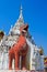 Singa statue at the door, Wat Phrathat Hariphunchai