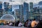 Singapore, 24 January 2024: Evening Marina Bay, transforming skyline skyscraper lights. Rows of people, awaiting show, vibrant