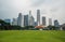 Singapore cityscape with football ground and high commercial buildings