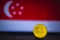 Singapore currency - Five cent coin of singapore isolated on singapore flag background. Singapore dollar 5 cent coin with space