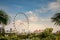 Singapore - december 2018: Singapore Flyer, the Largest Ferris Wheel in the World, seen from the Gardens by the Bay.