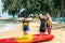 Singapore East Coast Park Beach. Canoe instructor giving guidance advises to two students