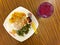Singapore hawker stall vegetarian meal: rice, vegetables, tofu, rose soda