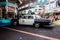 Singapore - May 25, 2019: Old vintage police car with black and white coloring parked on the street. Back and left side view