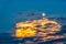Singapore - May 31, 2018: Sunrise moon with yellow clouds