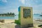 SINGAPORE, SINGAPORE - FEBRUARY 01, 2018: Informative sign over a stoned structure located over the sand in Palawan