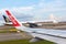 Singapore, Singapore-November 30, 2019: Changi Airport, planes with air asia and singapore airlines logos waiting for takeoff