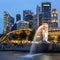 Singapore skyline, Marina bay and Merlion fountain view at dusk