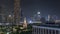 Singapore skyline with St. Andrew`s Cathedral aerial night timelapse hyperlapse.