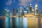 Singapore skyscapers in marina bay at night