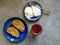Singapore-style breakfast at home: kaya toast, poached eggs, beet juice