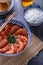 Singaporean chili shrimps with beer and chinese buns