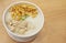 Singaporean Fish porridge served with cakwe or You Tiao