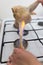 Singeing chicken on fire