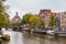 Singel canal and Round Lutheran Church in Amsterdam