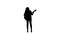 Singer plays the guitar and sings. White background. Silhouette . Slow motion