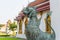 Singha or the lion statue in front of Thai temple