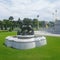 Singha sculpture at Ruen Yod Barom Mungkalanusaranee pavilion under bright blue sky