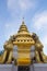 Singha statue with pagoda Wat Pra That sri Chomthong vora vihan, Chiangmai Thailand