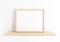 Single 8x10 Horizontal Wooden Frame mockup on wooden shelf and white wall