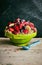 Single acai bowl of cereal and fruit on old table